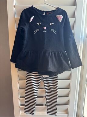 Black Cat Peplum Top and Striped Leggings outfit